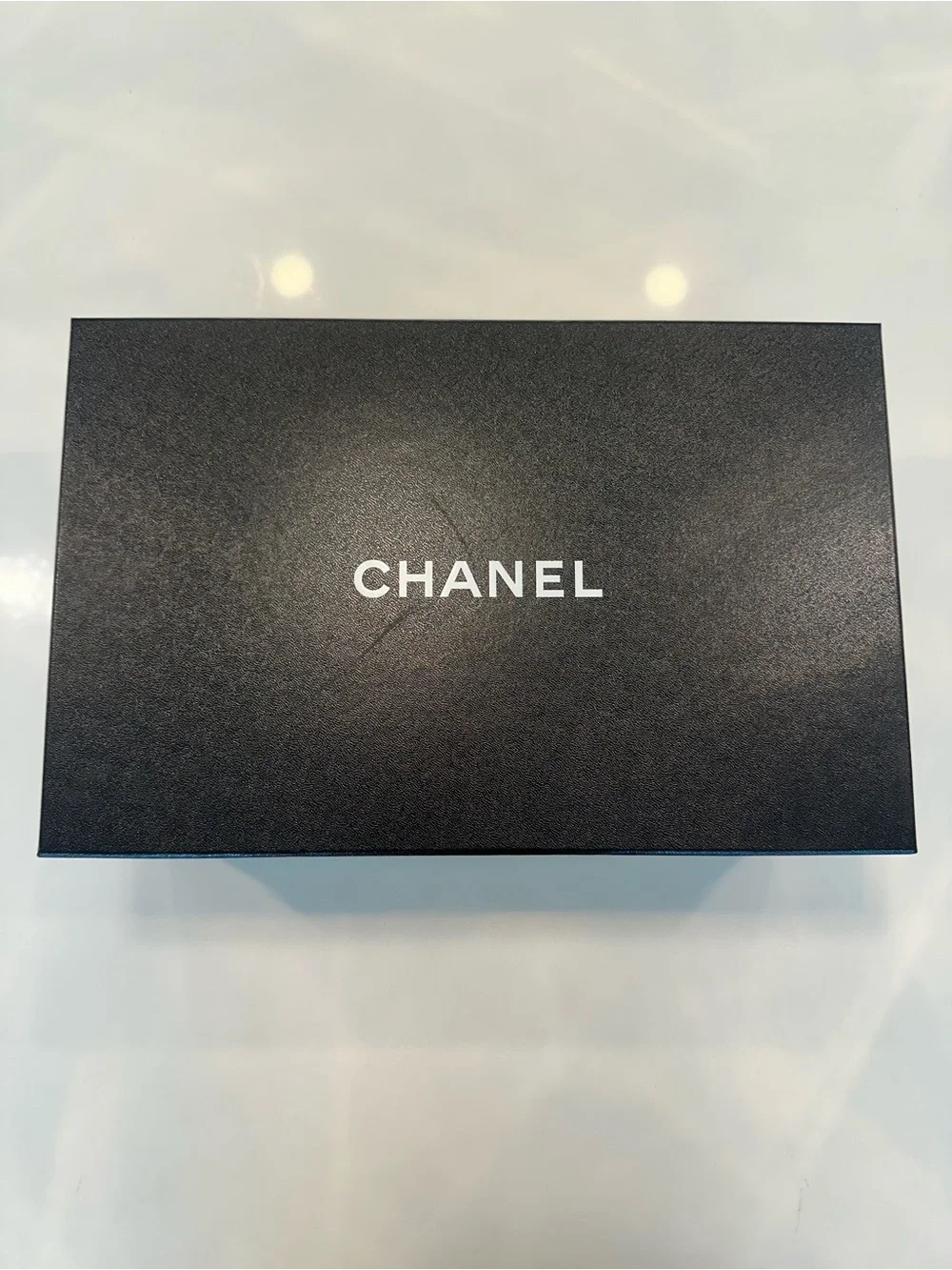 CHANEL White and Black Sneakers